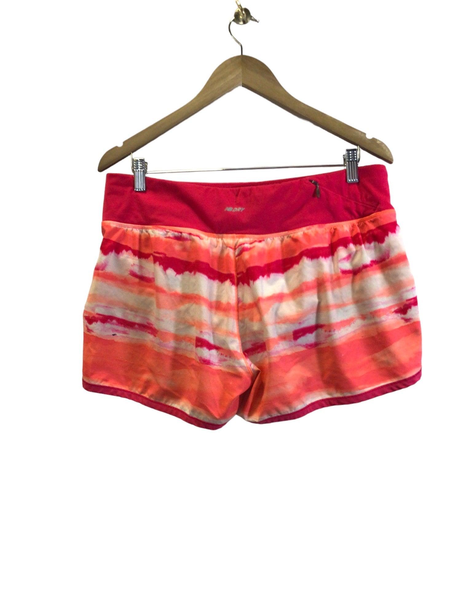NEW BALANCE Stylish Pink Women's Activewear Shorts & Skirts - Regular Fit, Size L